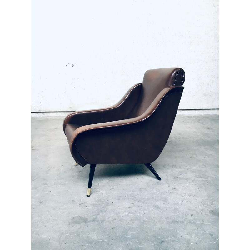 Pair of mid century brown leather armchairs, 1950s