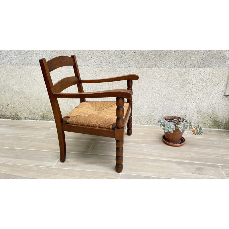 Vintage solid oakwood and straw armchair