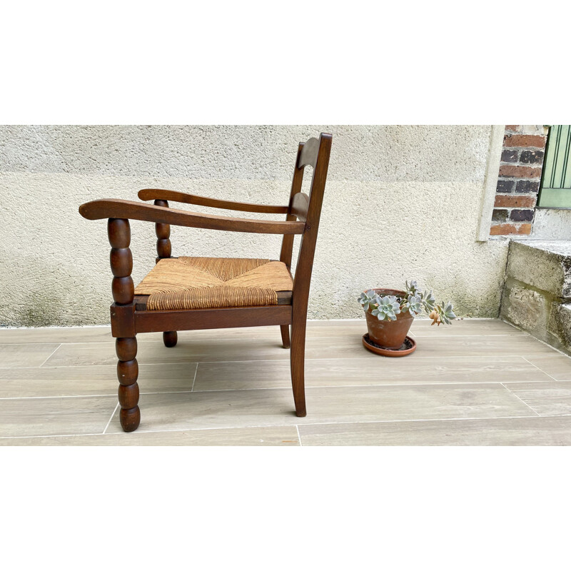 Fauteuil vintage en chêne massif et paille