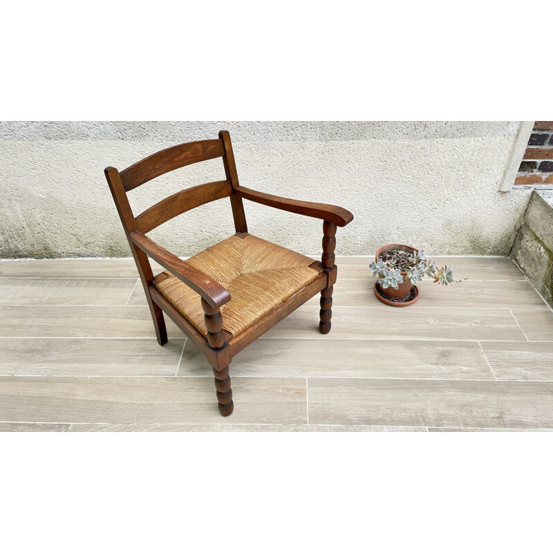 Fauteuil vintage en chêne massif et paille