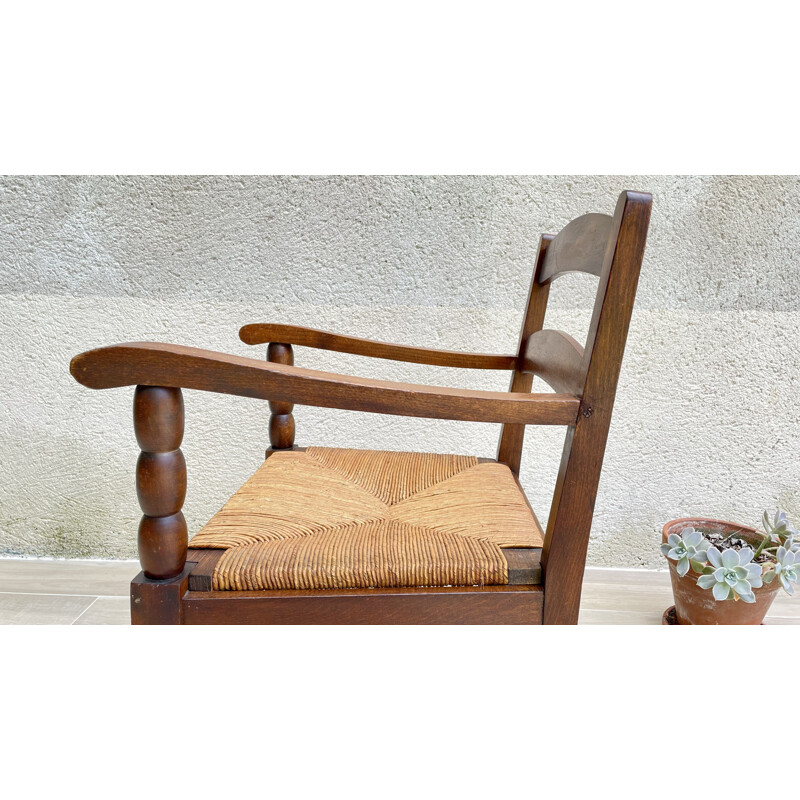 Vintage solid oakwood and straw armchair