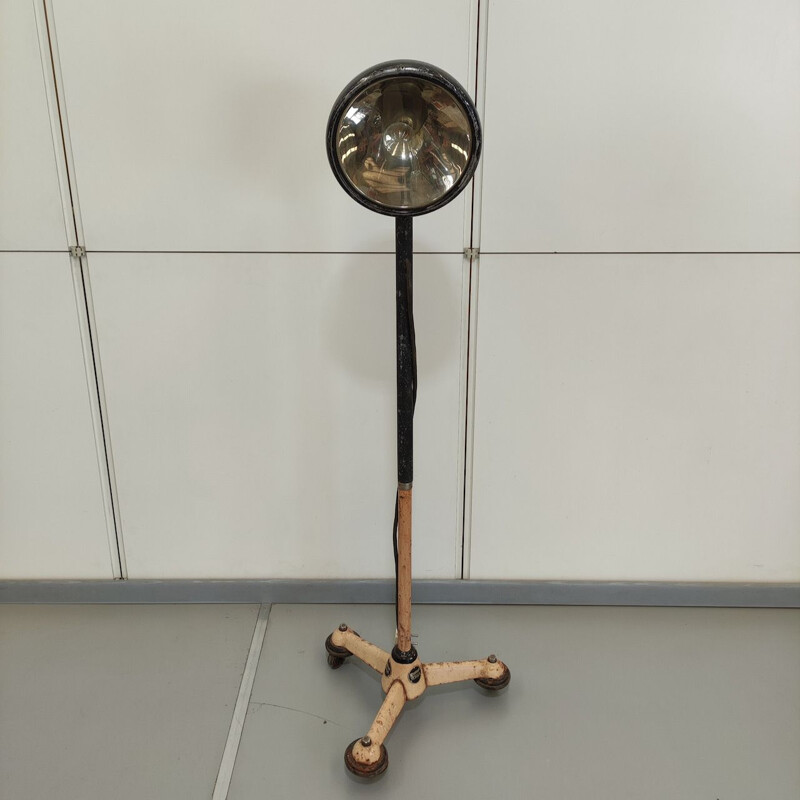 Lampadaire vintage à projecteur tripode réglabe
