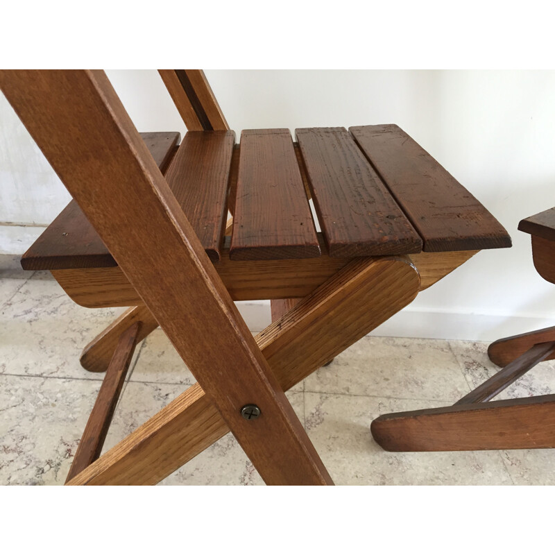 Pair of vintage stamped folding chairs