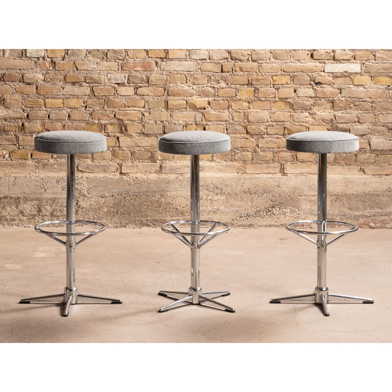 Vintage bar stool in blue-grey fabric with chrome steel legs