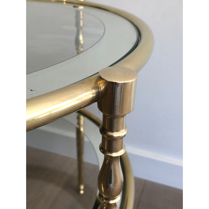 Round vintage brass pedestal table with glass tops surrounded by silver mirror, 1970