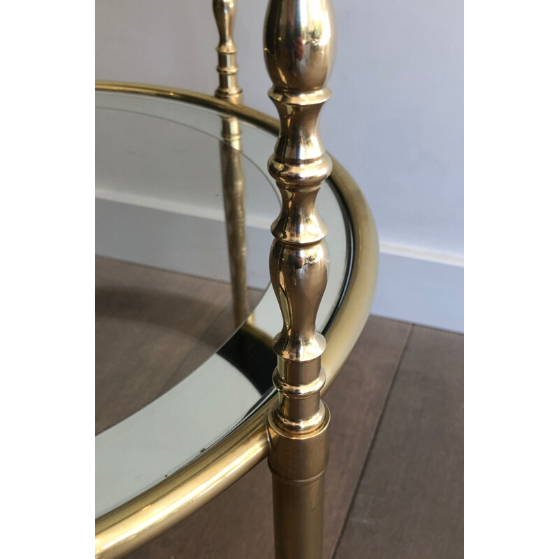 Round vintage brass pedestal table with glass tops surrounded by silver mirror, 1970