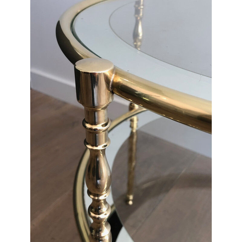 Round vintage brass pedestal table with glass tops surrounded by silver mirror, 1970