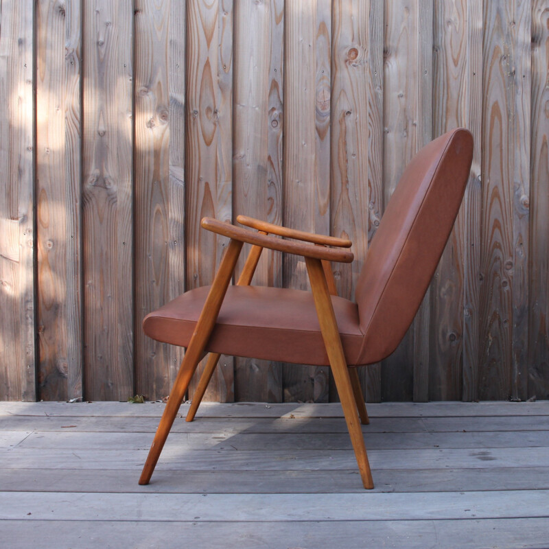 Fauteuil boomerang vintage en skaï