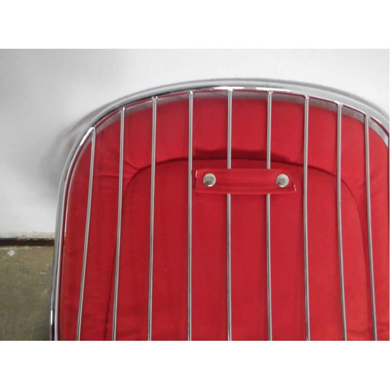 Pair of vintage rima armchairs in chromed metal and red fabric, Italy