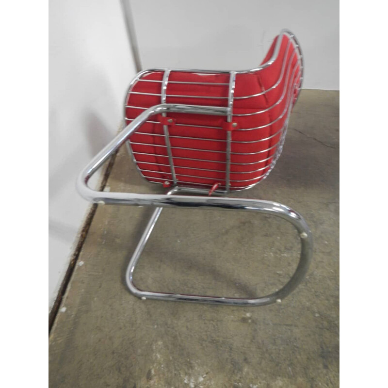 Pair of vintage rima armchairs in chromed metal and red fabric, Italy