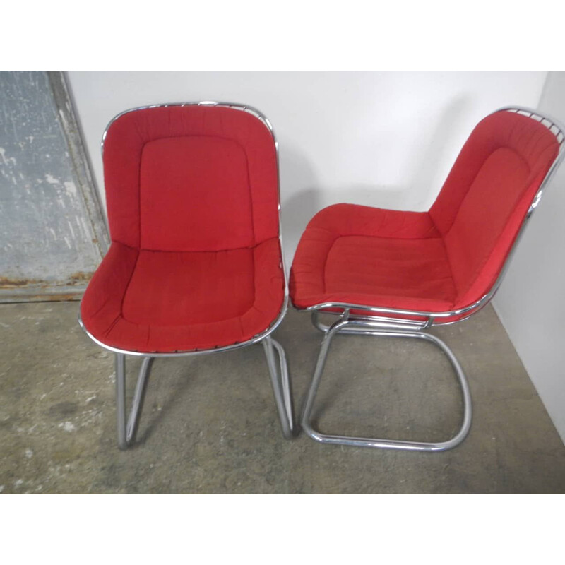 Pair of vintage rima armchairs in chromed metal and red fabric, Italy