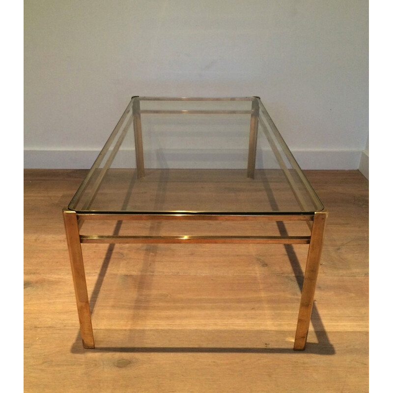 Vintage round brass coffee table with glass top by Baguès, 1940