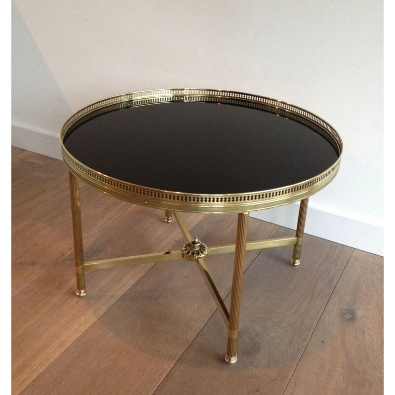 Vintage round brass coffee table with glass top by Baguès, 1940