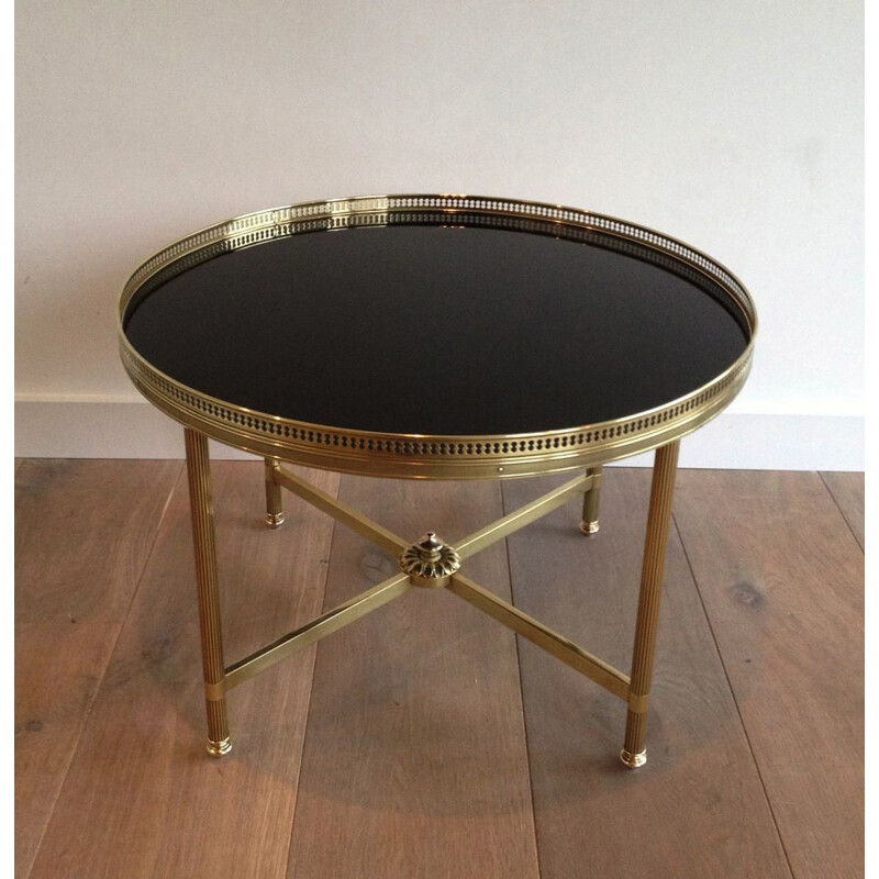 Vintage round brass coffee table with glass top by Baguès, 1940