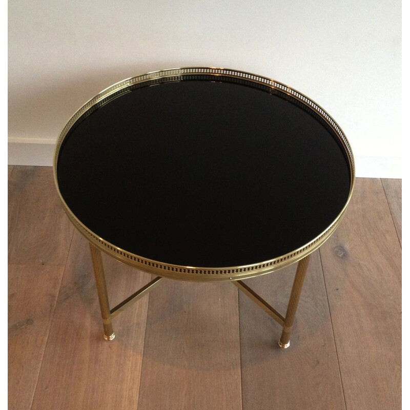 Vintage round brass coffee table with glass top by Baguès, 1940