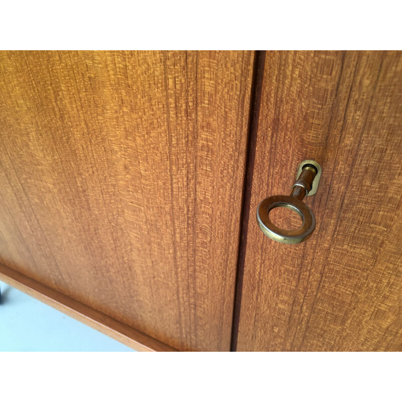 Vintage teak highboard in black metal legs