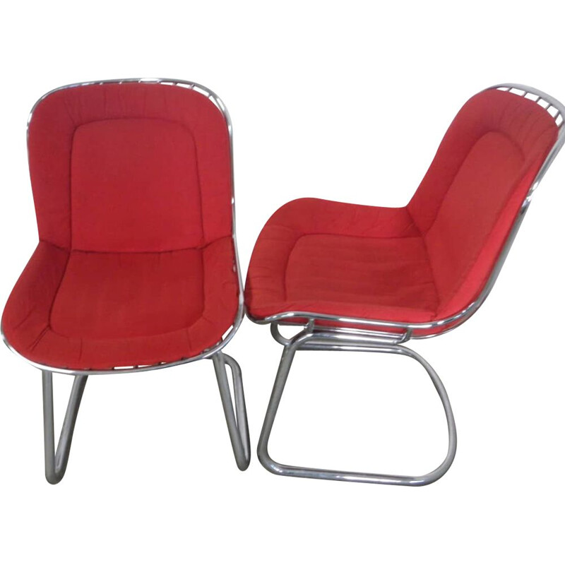 Pair of vintage rima armchairs in chromed metal and red fabric, Italy