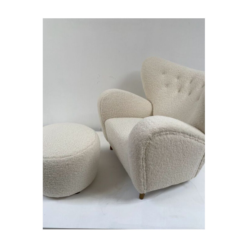 White vintage danish armchair and its footrest 1970