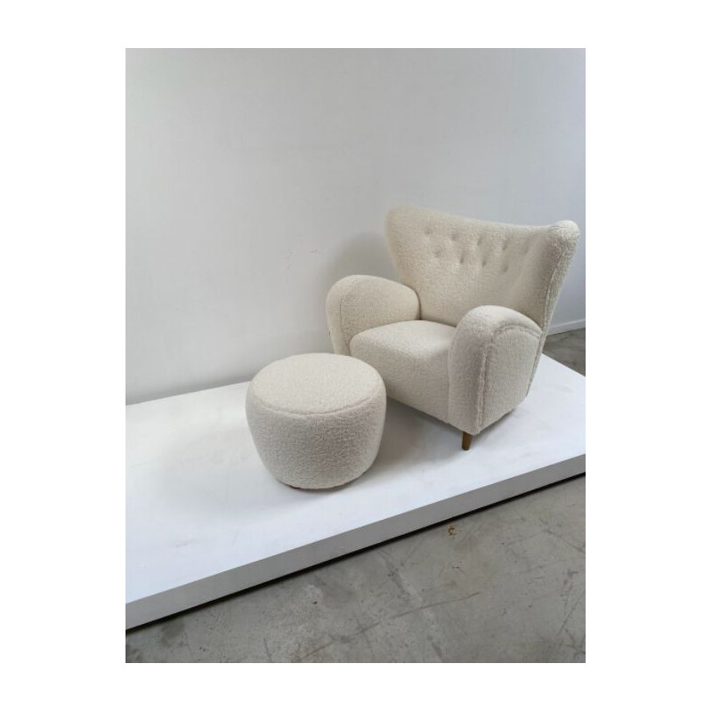 White vintage danish armchair and its footrest 1970