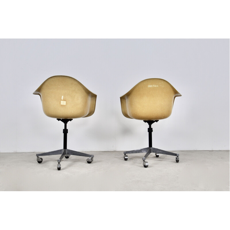 Pair of vintage armchairs on castors by Charles Ray Eames for Herman Miller, 1970