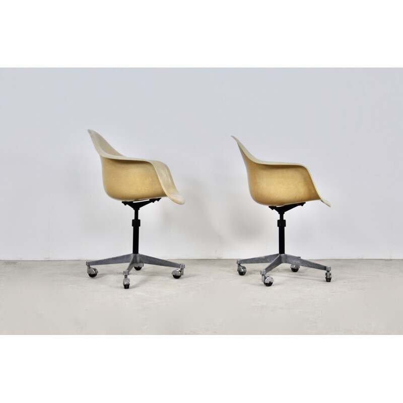 Pair of vintage armchairs on castors by Charles Ray Eames for Herman Miller, 1970