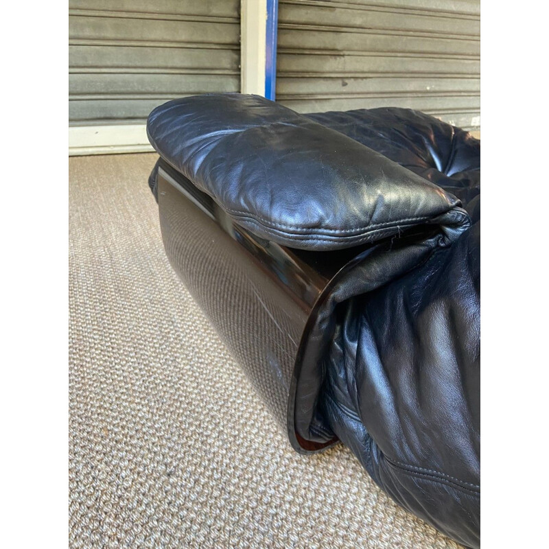 Marsala vintage black leather armchair and ottoman by Michel Ducaroy, 1970