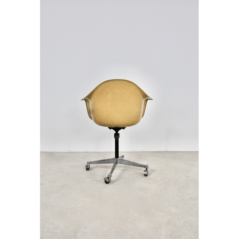 Vintage armchair on castors by Charles Ray Eames for Herman Miller, 1970