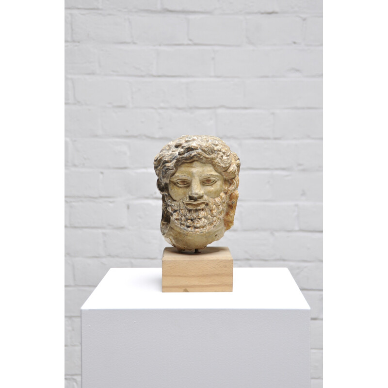 Roman vintage head sculpture in sandstone