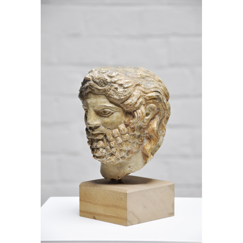 Roman vintage head sculpture in sandstone