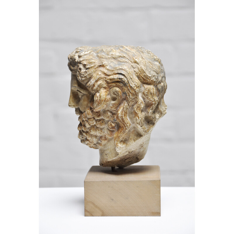 Roman vintage head sculpture in sandstone