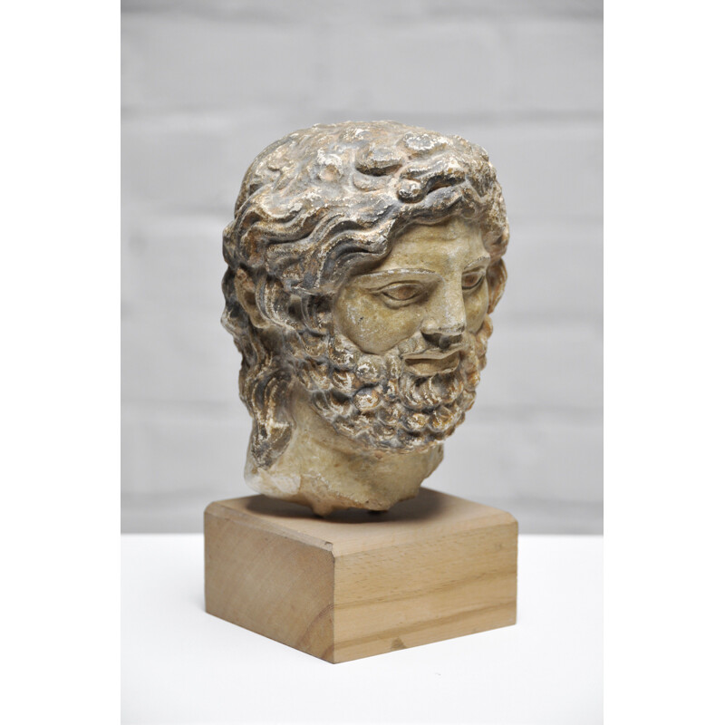 Roman vintage head sculpture in sandstone