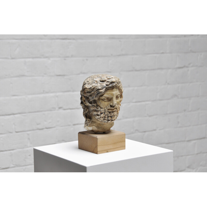 Roman vintage head sculpture in sandstone