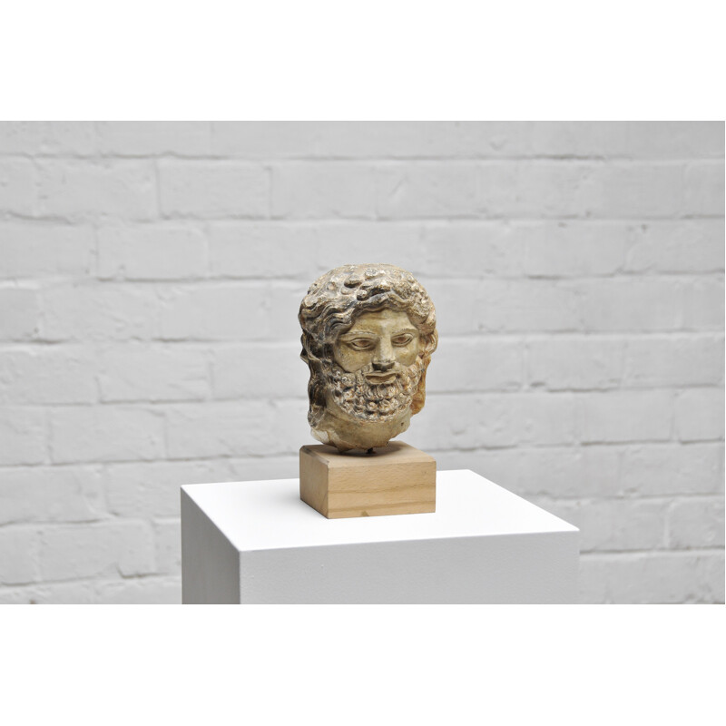Roman vintage head sculpture in sandstone