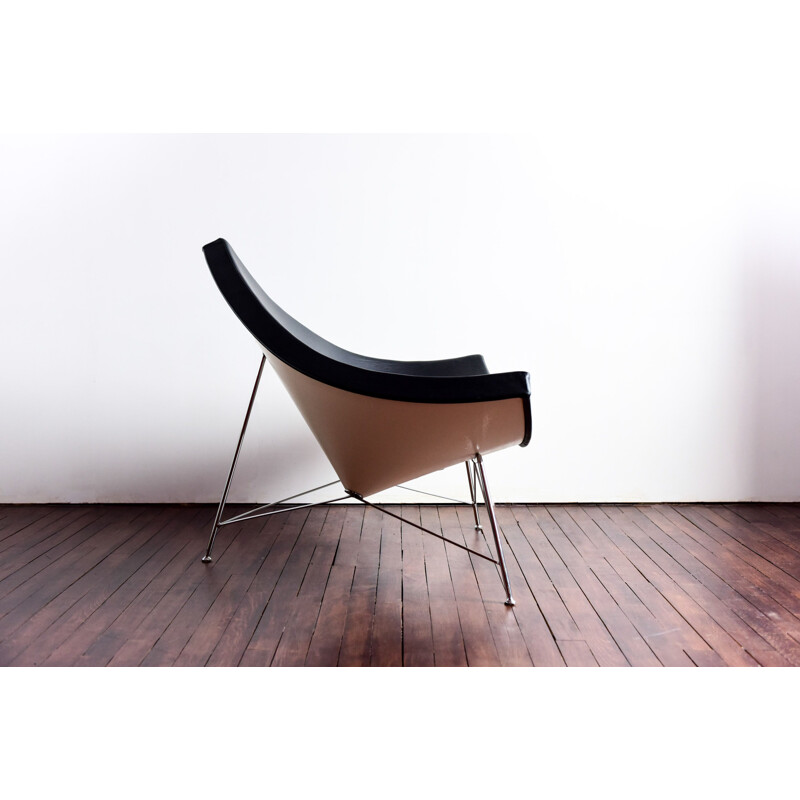 Vintage Coconut armchair in black leather by George Nelson