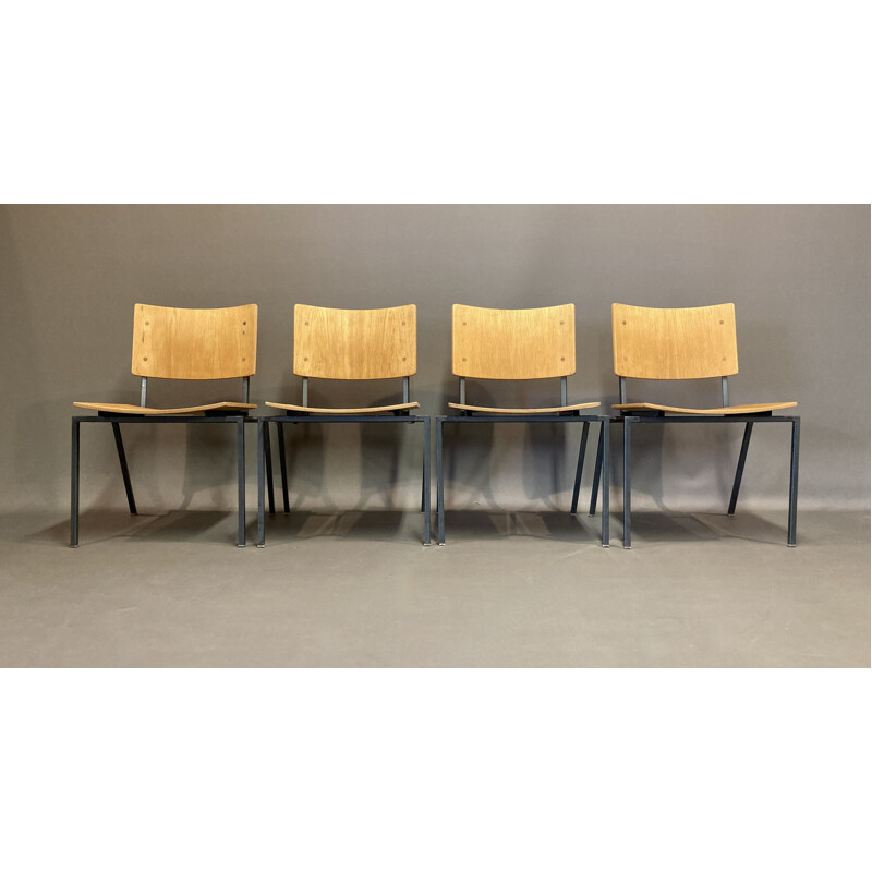Set of 8 industrial chairs in oakwood and metal, 1960