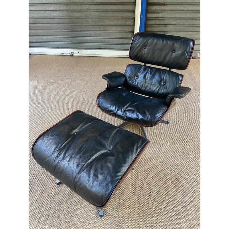 Vintage black lounge chair with ottoman by Charles Eames, 1960