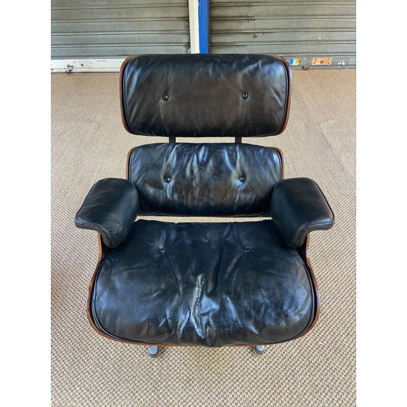Vintage black lounge chair with ottoman by Charles Eames, 1960