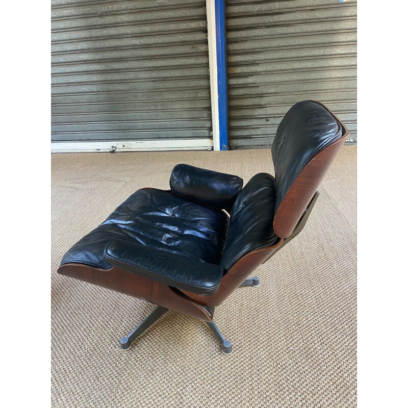 Vintage black lounge chair with ottoman by Charles Eames, 1960