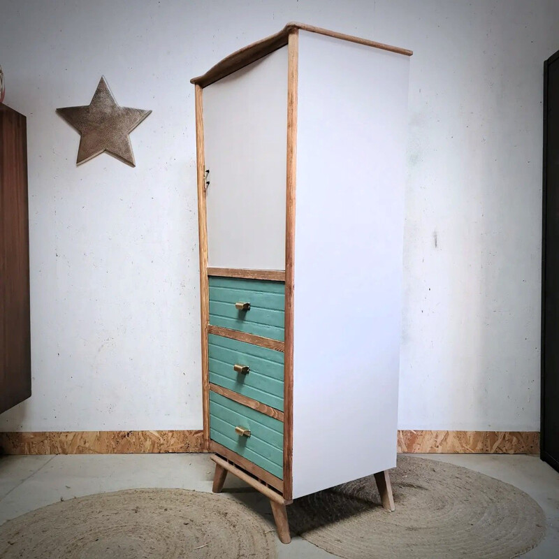 Narrow vintage cabinet with compass legs