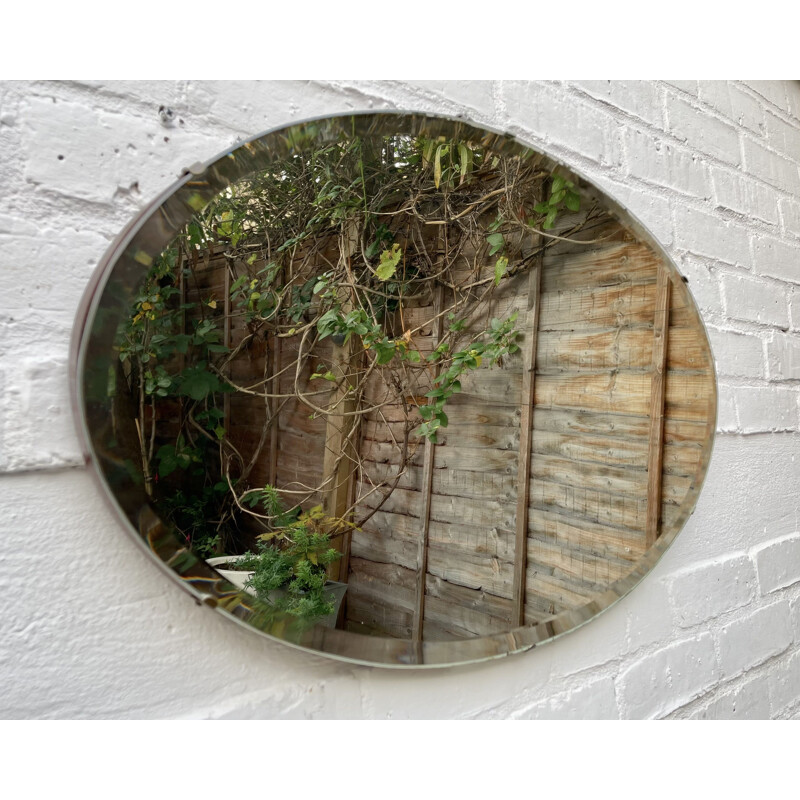 Vintage oval wall mirror with bevelled edge, 1930
