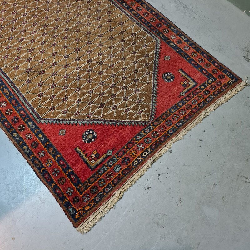 Vintage Persian hand-knotted wool rug