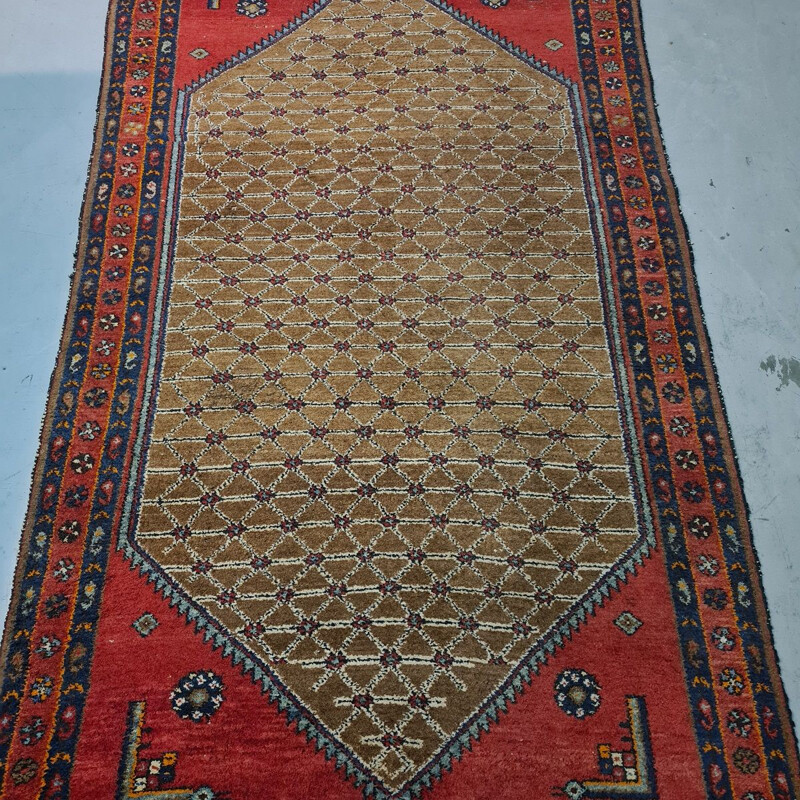 Vintage Persian hand-knotted wool rug