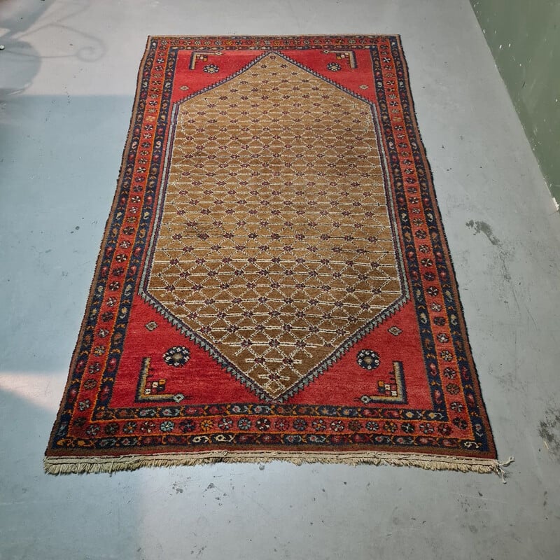 Vintage Persian hand-knotted wool rug