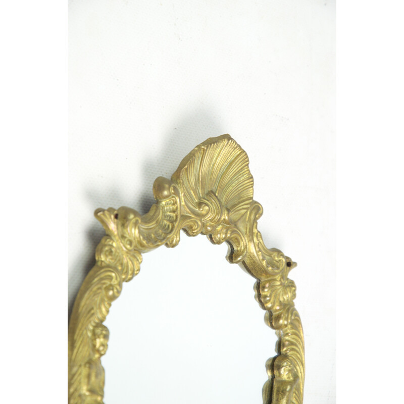 Vintage mirror in a brass frame, 1960s