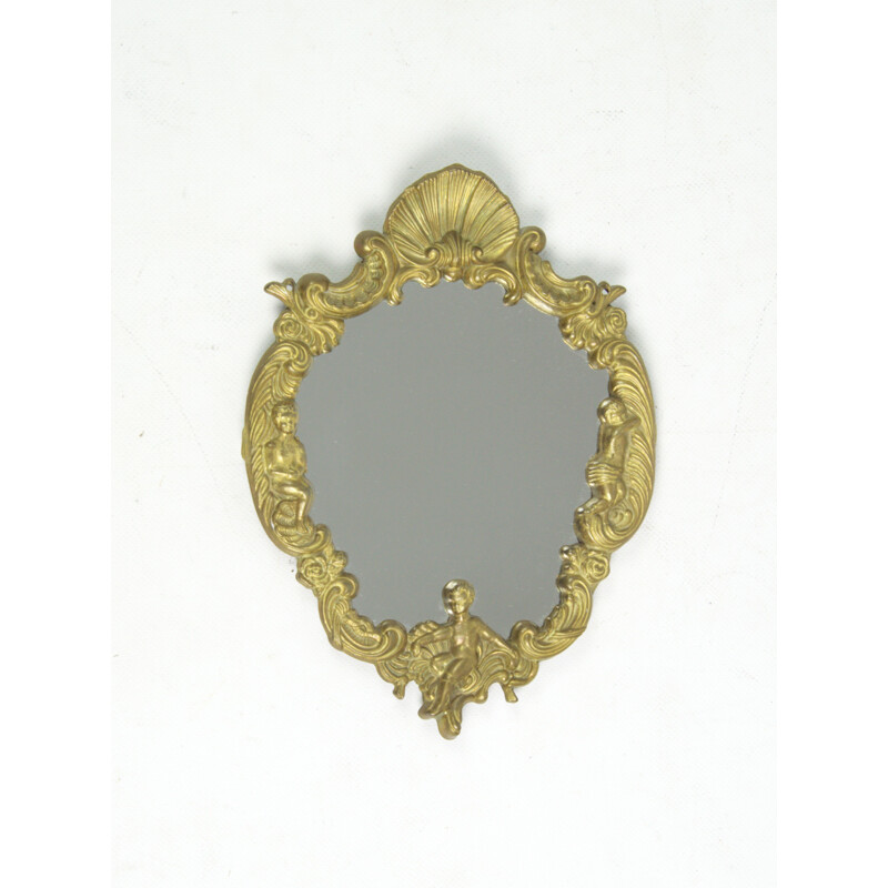 Vintage mirror in a brass frame, 1960s