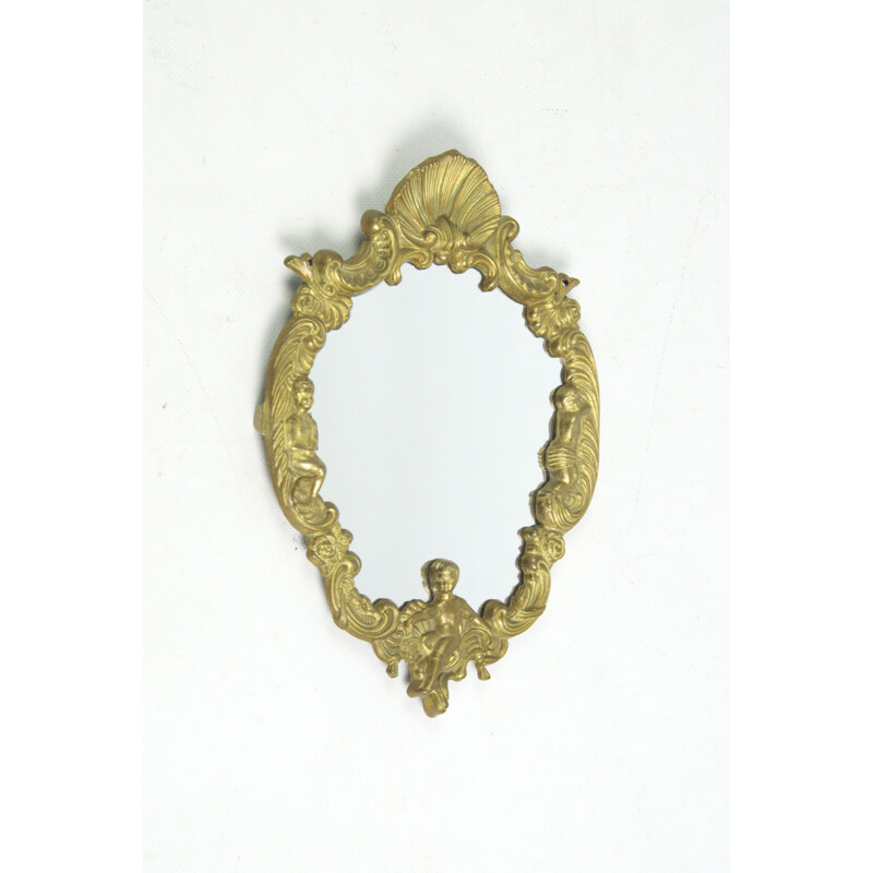 Vintage mirror in a brass frame, 1960s