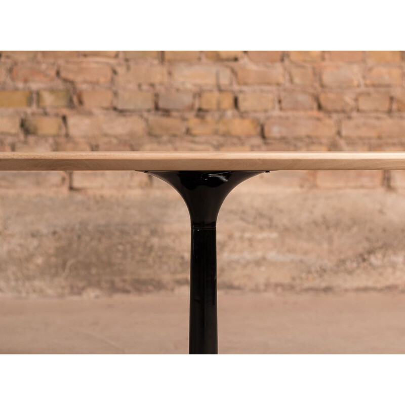 Vintage coffee table in solid walnut with a central metal foot