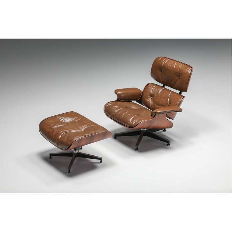 Vintage armchair with ottoman in brown by Eames for Herman Miller, 1960s