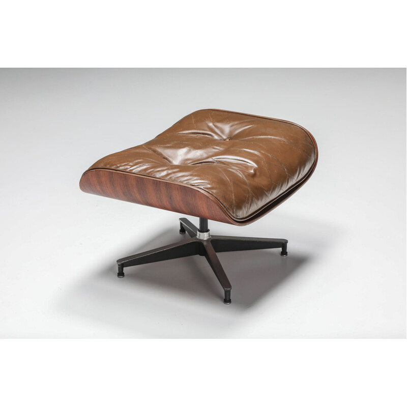 Vintage armchair with ottoman in brown by Eames for Herman Miller, 1960s