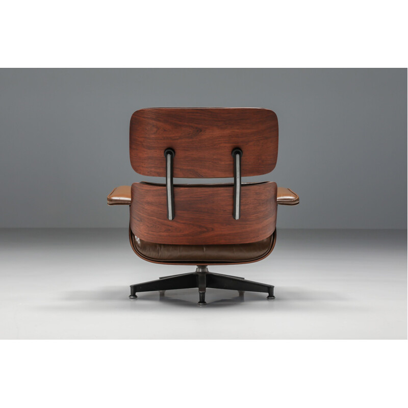 Vintage armchair with ottoman in brown by Eames for Herman Miller, 1960s